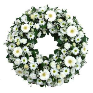 corona funebre bianca e verde con fiori misti